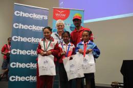 Tiffaney Bezuidenhoudt in the middle won first place, and and to her left Laurnay Saal in third place.